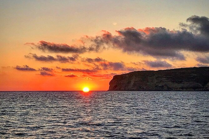 3-Hour Dolphin watching at sunset with aperitif - Where the Sea Shows Off: Bays, Turns, and the Color Shift
