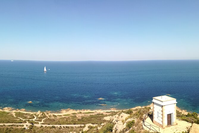 4 × 4 excursion to the beaches of Biderosa and Capo Comino - Spiaggia di Capo Comino: dunes, crystal water, and the shade reality