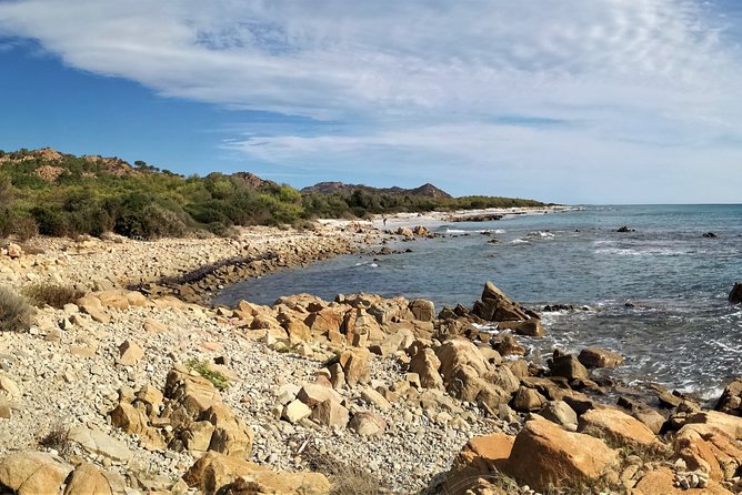 4x4 excursion between mountain and sea - Stop 2: Spiaggia di Capo Comino and the dunes-meet-sea payoff