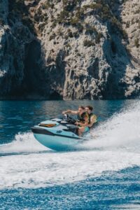 Alcudia: JetSki Tour Coll Baix beach & Caves (free Photos) - North coast route: Alcanada lighthouse island photo moments