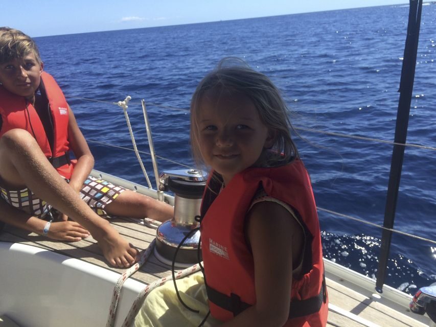 Alcudia: Sailing Yacht Excursion with Wine & Tapas - Sailing Lessons Without the Pressure