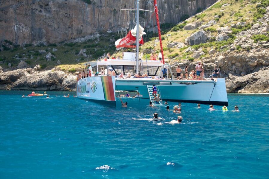 Alcudia: Sunset Catamaran Tour with Dinner and Snorkeling - Snorkeling chances and how to make the water time count