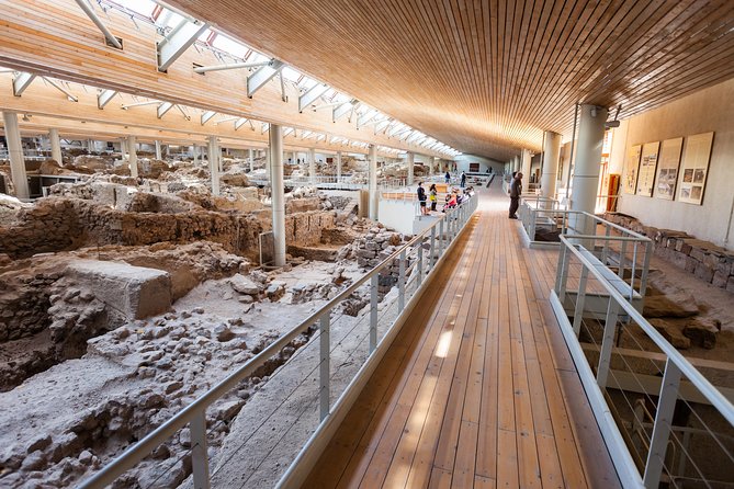 Archaeological Bus Tour To Akrotiri Excavations & Red Beach - Megalochori Village: Old Streets, Earthquake Scars, Local Life