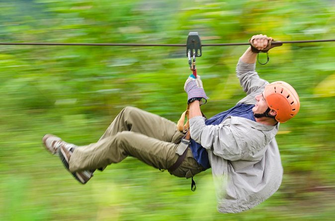 Arenal Volcano Combination Tour: Zipline, Tubing and Hot Springs - A 4-hour Arenal combo: canopy skies, Maleku culture, river rapids, hot springs
