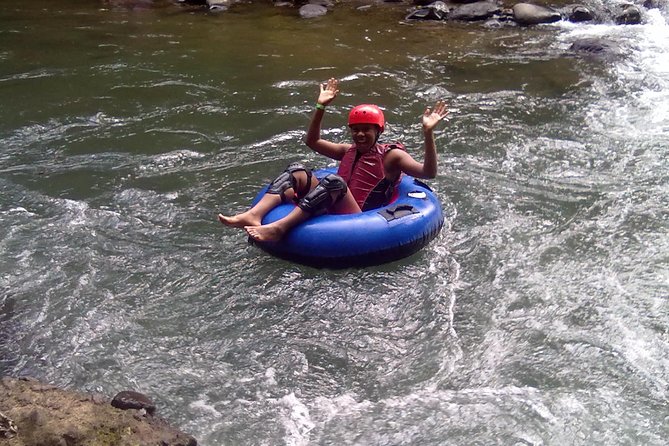Arenal Volcano Combination Tour: Zipline, Tubing and Hot Springs - Tubing the Arenal River rapids: getting to the tubes and briefing up front