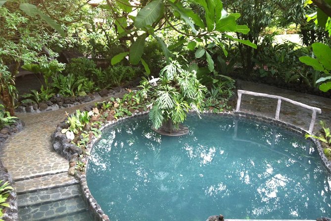 Arenal Volcano Combination Tour: Zipline, Tubing and Hot Springs - Ziplining over Arenal forest: 13 platforms, nine lines, one hanging bridge