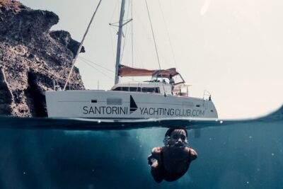 Beautiful Day Catamaran Caldera Cruise incl. Meal & Drinks - What you pay for: BBQ lunch, open bar, free snorkeling gear, transfers