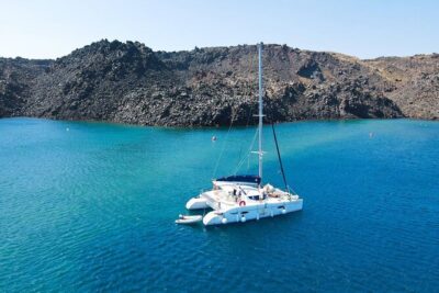 Best of Santorini Private Half-Day Catamaran Cruise with transfer and meal - Getting from your hotel to the dock without wasting vacation time