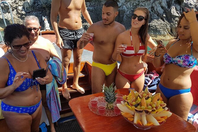 Boat excursion Taormina Giardini Naxos - Aperitivo on board: Prosecco and almond cookie, plus the best seat strategy