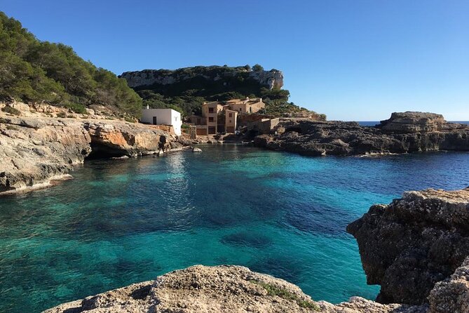 Boat tour Cala Figuera, Es Pontas, Caló de Moro, Cala Marmols - The charming-houses rocky cove: a scenic intermission that’s easy to love