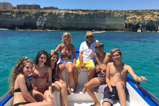 Boat tour Ortigia, sea caves and Pillirina 2h - Ognina’s rocky coast: the final stretch with story time built in