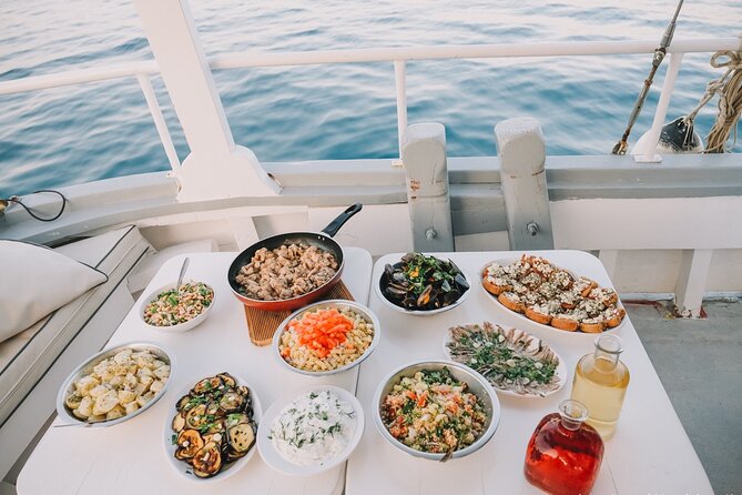 Boat Trip to Anthony Quinn, Kallithea & Traganou Bays - Snorkeling reality check: gear included, but conditions vary