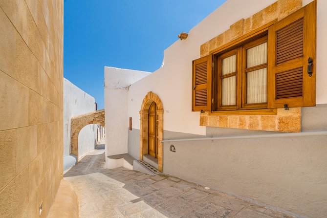 Boat Trip to LINDOS with Swimming Stops at Anthony Quinn's & Tsambika Bays - Boat Comfort on the Discovery: Seats, Sun Deck, Snacks, and Toilets