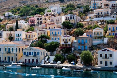 Boat Trip to Symi Island with swimming stop at St George Bay - Meeting point in Rhodes and hotel pickup reality