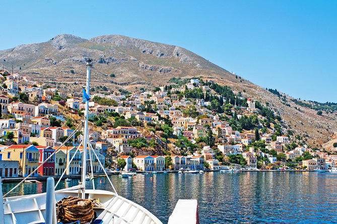Boat Trip to Symi Island with swimming stop at St George Bay - Onboard basics: restroom, seating, and what to wear