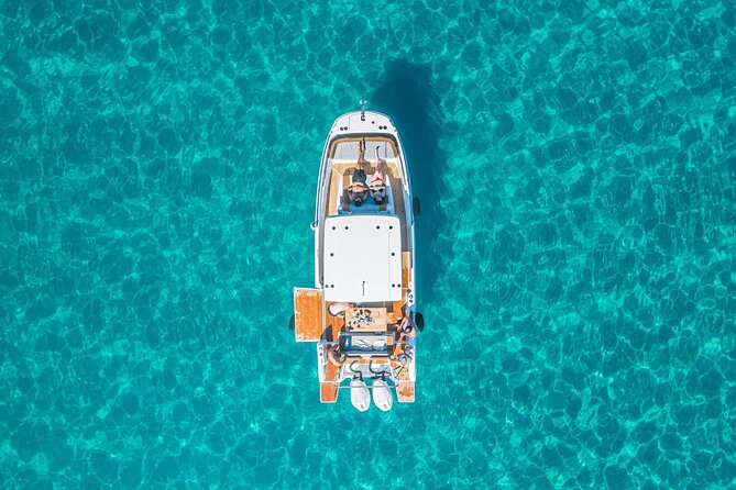 Cagliari 3 Hours Luxury Motorboat Tour - Wine and Snorkeling - The Devil saddle swim route: coves, anchor time, and what you’re really buying