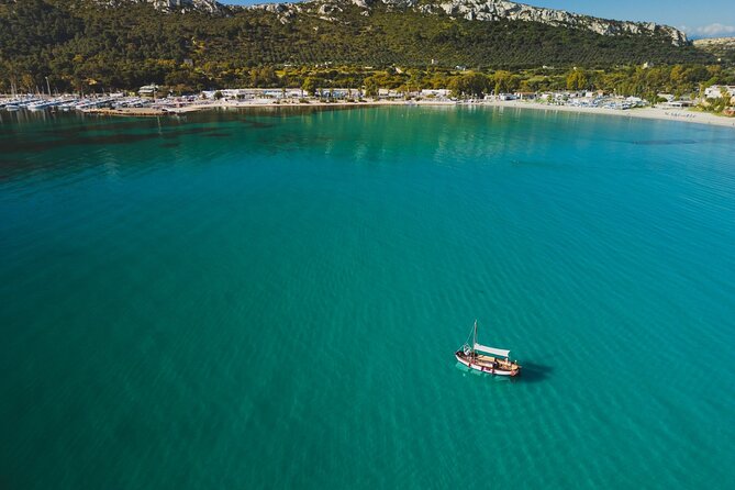 Cagliari : Gozzo Tour with 3 Swim Stops, Snorkeling & Local Food - Calamosca Bay: The Longer Swim Session That Makes This Tour Worth It