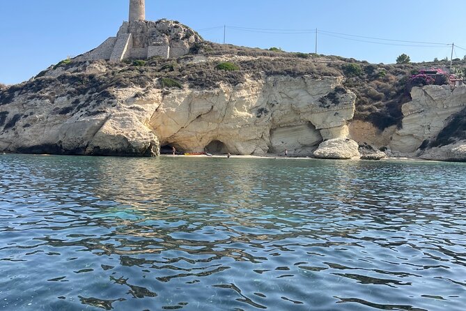 Cagliari Gulf Boat tour : 5 stops, snorkeling & local aperitif - Calamosca Beach and Cala Fighera: two kinds of water