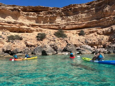 Cala Codolar: Guided Sea Kayaking and Snorkeling Tour - The guided kayak route: cliffs, caves, and secret coves