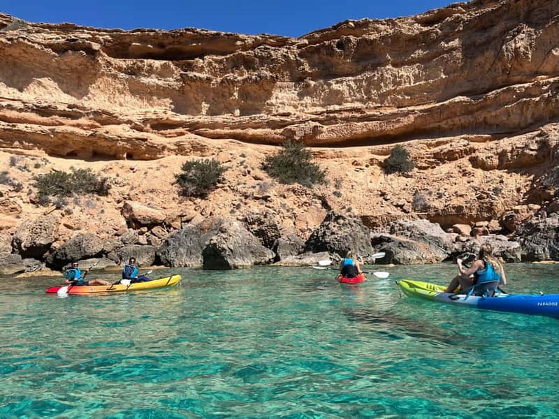 Cala Codolar: Guided Sea Kayaking and Snorkeling Tour - The guided kayak route: cliffs, caves, and secret coves