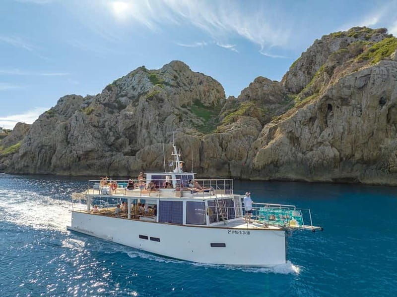 Cala Rajada: Boat Excursion with Drinks and Food - The captain and crew vibe on a 20-meter boat