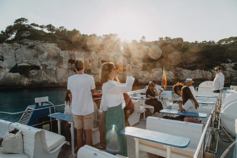 Cala'n Bosch: 2-Hour Sunset Sightseeing Tour - Boarding at Amigo’s Boat Trips: what the boat and seating are really like