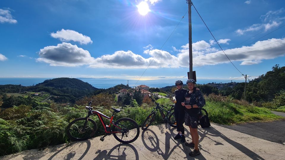 Camacha: Levada Trail e-Bike Guided Tour - Climbing dirt road toward Santo da Serra viewpoint (and sheep time)