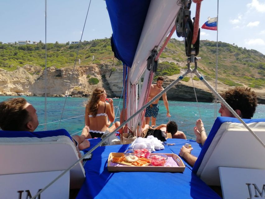 Can Pastilla: Sailboat Tour with Snorkeling, Tapas & Drinks - What to bring so you’re comfortable in the real-world weather