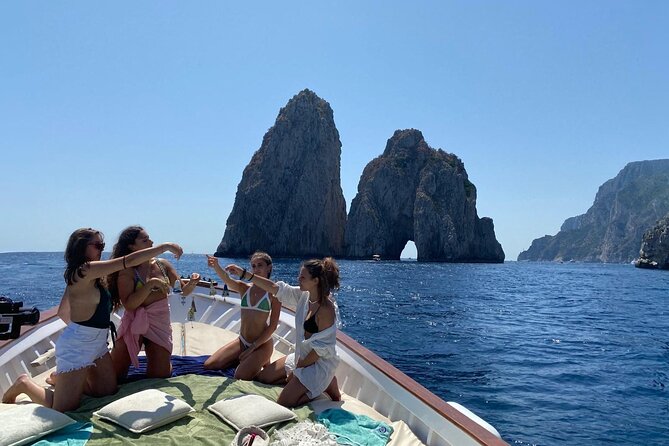Capri Boat Tour: Grottoes, Swim & Sip Limoncello in a Small Group - Marina Grande meeting point: HP Travel and getting to the boat on time
