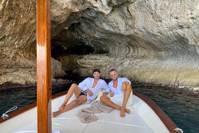 Capri Boat Tour: Grottoes, Swim & Sip Limoncello in a Small Group - Coastline highlights: Natural Arch, Malaparte, Punta Carena, and Faraglioni