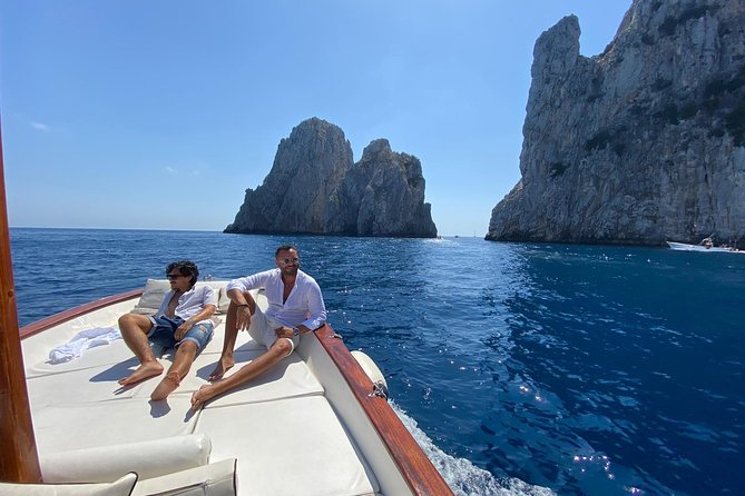 Capri Boat Tour: Grottoes, Swim & Sip Limoncello in a Small Group - English commentary and photo moments: how to get value from the guide