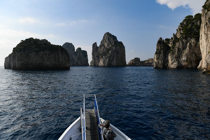 Capri Coast to Coast: Boat Tour with Optional Blue Grotto - Grottos in Motion: Marvellous, White, Green, and How the Blue Grotto Fits