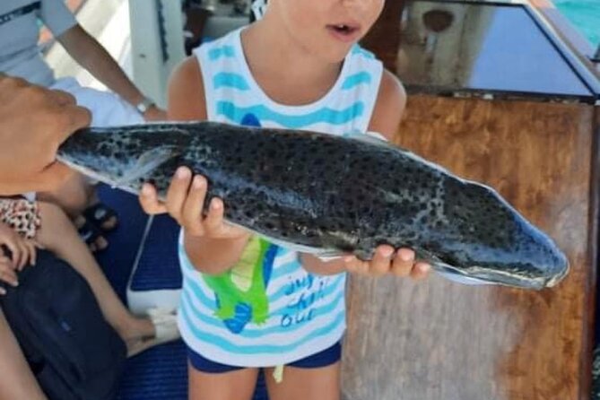 Captain Manolis Fishing with barbecue on the boat - Swimming and snorkeling time: the best “backup plan” for non-fishers