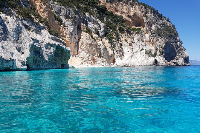 Catamaran Day Trip to the Cale di Orosei with Lunch - The First Stops: Monolite di Pedra Longa and Cala Goloritze