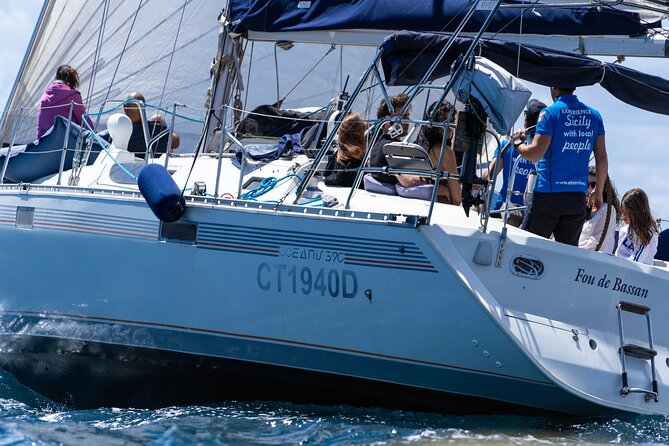 Catania: Sail Cyclops Coast by Boat and Enjoy a Sicilian Aperitif - The Black Coastline Moment: Photos, Atmosphere, and a Different Mood