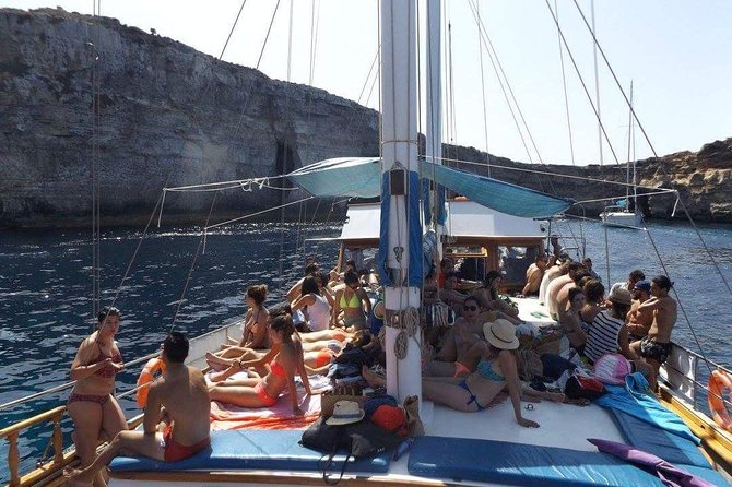 Comino, Blue Lagoon and Caves. Tour A - Crystal Lagoon and Comino Caves: Photos, Rock Faces, and the Best Views Before Swimming