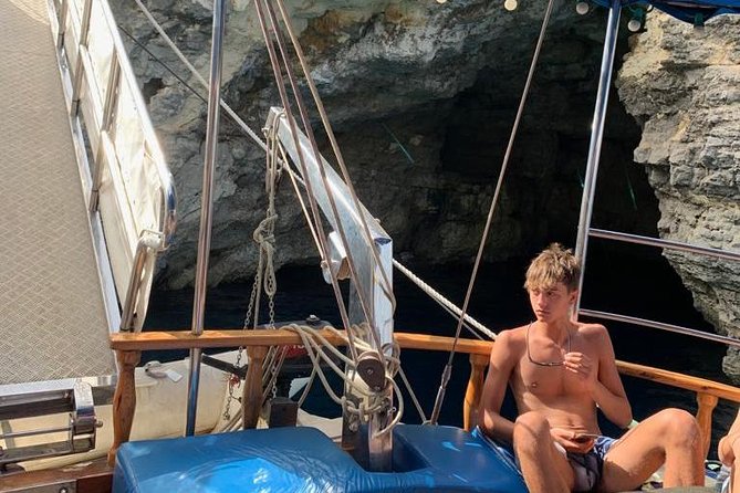 Comino, Blue Lagoon and Caves. Tour A - Onboard Comfort and Practical Setup: Sun Deck, Shade Deck, Showers, and Ladders
