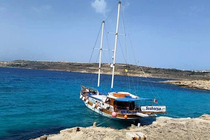 Comino, Blue Lagoon and Caves. Tour A - Getting From Bugibba to Comino: Shipwreck Views and Mellieha Landmarks