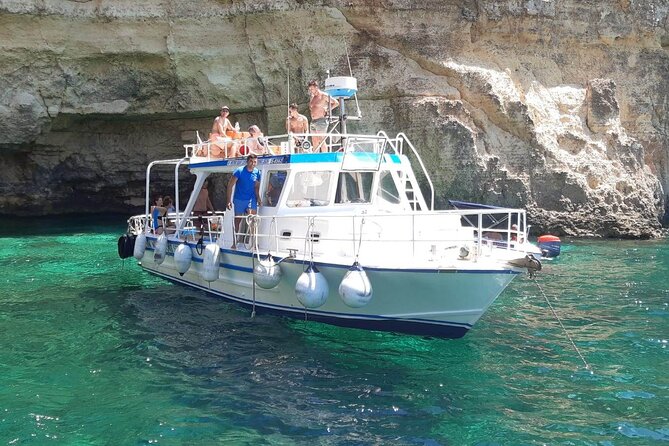 Comino Blue Lagoon and Gozo Private Boat Charter: Lucky Lady Boat - Stop 2 on Comino: Crystal Lagoon caves and film-location scenery (about 1.5 hours)