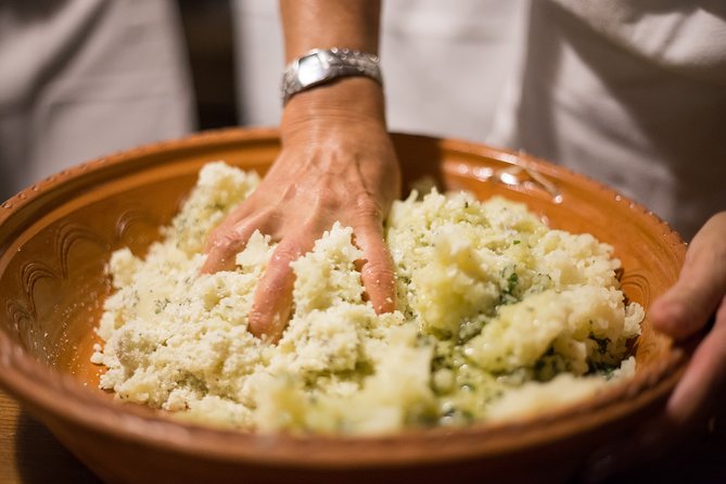 Cooking Class in a Secret Courtyard - Culurgiones (Sardinian Pasta) - Aprons on: kneading and shaping culurgiones by hand