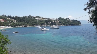 Corfu boat trip, swimming & BBQ - Erimitis Beach Time: Swimming, Sunbathing, and Sea Conditions