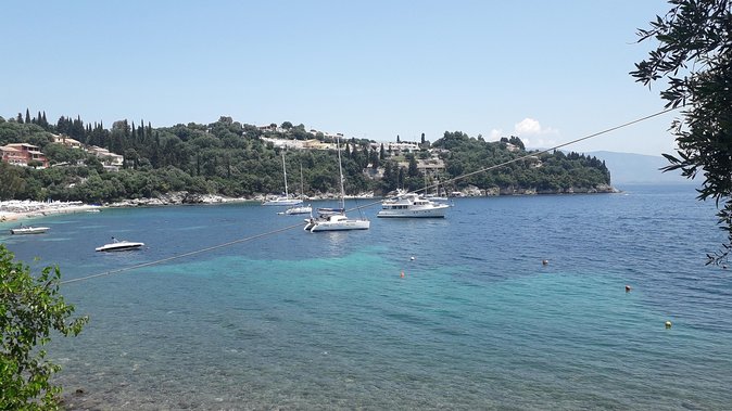 Corfu boat trip, swimming & BBQ - Erimitis Beach Time: Swimming, Sunbathing, and Sea Conditions
