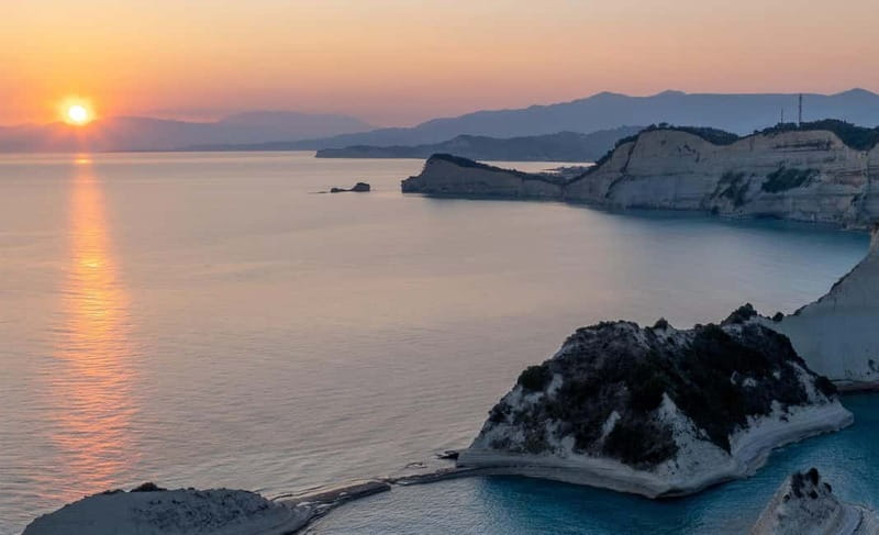 Corfu: Palaiokastritsa Swimming and Loggas Beach Sunset Tour - Loggas Beach Sunset: Limestone Cliffs and That Final Hour