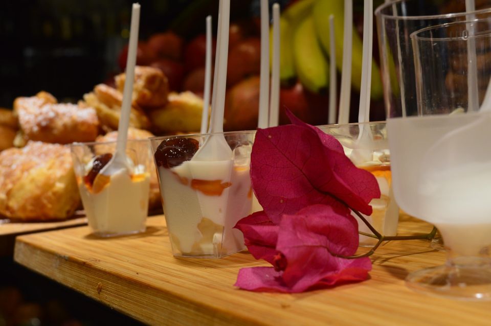 Corfu Town: Guided Walking Tour and Local Food Tastings - The Breakfast-Style Food Stops: Pies, Loukoumades, Yoghurt, Ginger Beer