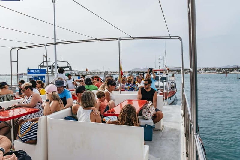 Desde Corralejo: Lobos Island Ferry with Optional Transfer - Snorkeling, Fishing, and Glass-Bottom Water Watching