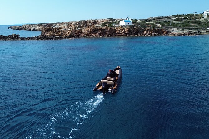 Discover Hidden Gems around Paros | Private Boat Tour - Passing Antiparos caves: scenic photos from a breathtaking distance