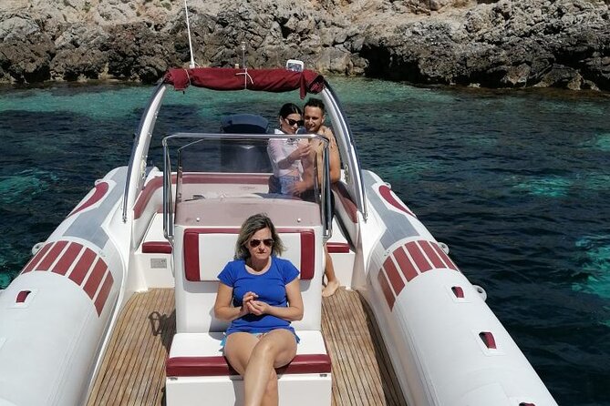Egadi Islands Boat Tour: Favignana and Levanzo with Lunch - Favignana grottos: seeing the coast from water-level