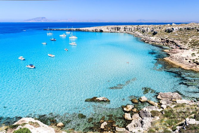Egadi Sail Boat Tour to Favignana and Levanzo from Trapani - Swim stop 1 on Favignana: Scogliera di Cala Rossa