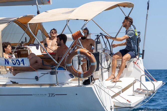 Egadi Sail Boat Tour to Favignana and Levanzo from Trapani - Swim stop 2: Scogliera Cala Azzurra and its signature cove feel