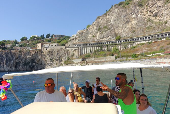 Escursioni in barca Taormina Giardini Naxos Isola bella - Aperitivo on the water: prosecco, Sicilian bites, and a calmer pace